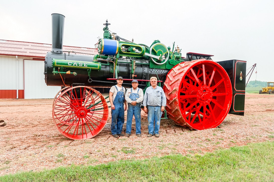 Kory Anderson, Gary Bradley and Kevin Anderson stand with the 150 HP Case steamer. After 12 years of work and a lifetime of dreaming, the engine is finally complete and ready for the trip home to Andover, South Dakota.